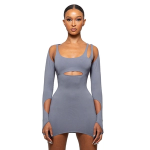 Detail of smoky grey cutout long sleeve mini dress featuring finger-loop sleeve design