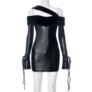 Detail of black PU leather dress featuring faux fur collar and drawstring sleeve ties