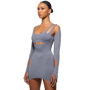 Macro shot of grey long-sleeve dress featuring chest cut-out and ribbed fabric detail