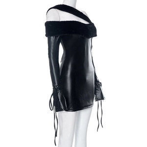 Detail of black faux leather mini dress featuring fuzzy fur collar and lace-up sleeves