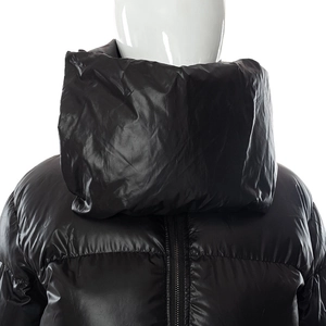 Close-up of black glossy high collar puffy jacket with metallic zipper detail