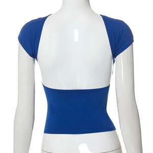 Detail of royal blue backless tight-fit T-shirt with open back cut and seamless stitching