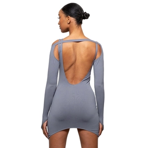 Detail view of backless U-shape cutout and long sleeve design on grey mini dress