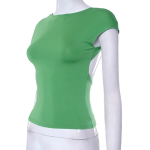 Detail of grass green slim fit top featuring a backless cutout design on a mannequin