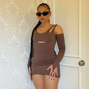 Detail of a brown long-sleeved dress with unique hollow-out design and slim fit cut