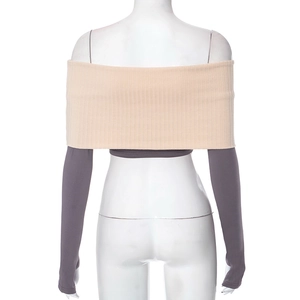 Detail of beige ribbed knit off-shoulder top and grey long sleeve crop top set