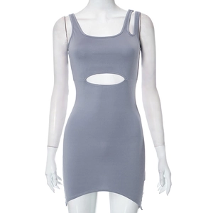 Detailed view of the dark grey cutout knit dress featuring a fitted silhouette and hollow waist