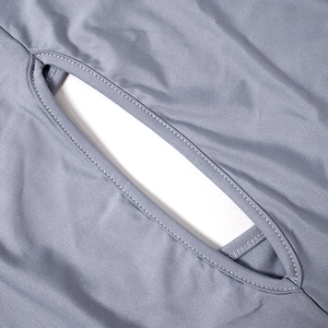 Macro detail of the grey bodycon dress showing the oval cutout and reinforced stitching
