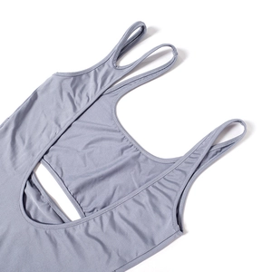 Detail view of the multi-strap design and fine stitching on a blue-grey bodycon dress