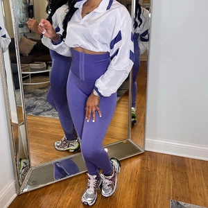 Set sportivo donna con giacca zip bicolore e leggings modellanti a vita alta