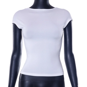 Detail of a white form-fitting short-sleeve top with an elegant boat neck on a mannequin