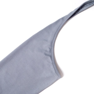 Close-up of blue-grey bodycon dress showing high-quality stitching and elastic fabric detail
