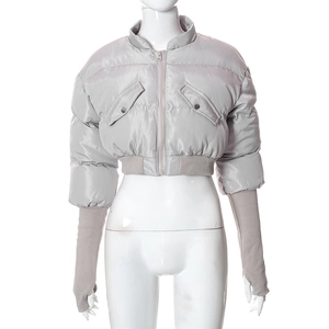 Detail view of grey padded puffer jacket featuring long ribbed knit thumbhole sleeve cuffs