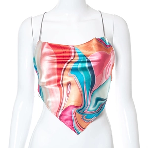 Detail of colorful fluid print satin crop top with halter neck and cowl neckline