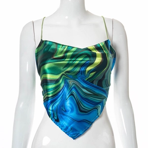 Detail of blue and green marble print silk bandana top with thin spaghetti straps