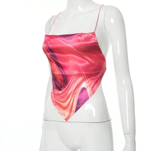 Detail of satin halter top featuring pink marble print and delicate spaghetti straps