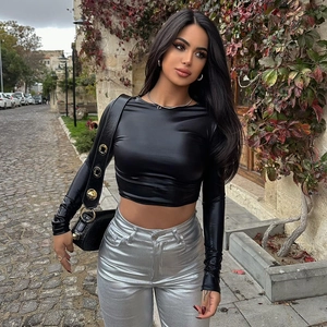 Women's slim fit black cropped top and silver metallic trousers streetwear fashion