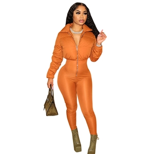 Slim-fit ginger orange long-sleeve zipper puffer jumpsuit with collar for women