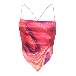 Detail of satin halter top featuring marble swirl pattern and thin cross straps