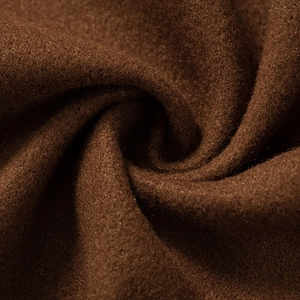 Close-up of deep brown wool-like fabric texture showing soft fuzzy material quality