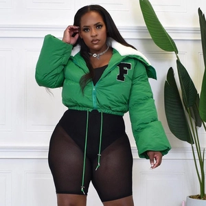 Detail of green puffer jacket featuring white sherpa collar and letter F embroidery
