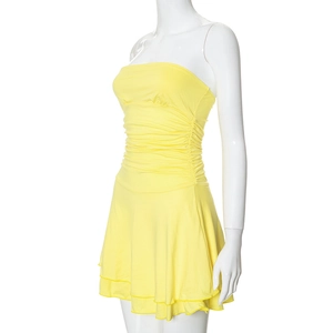 Detail of bright yellow strapless mini dress with side ruching and ruffled hem design