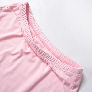 Detail view of pink elastic waistband on casual high-stretch mini skirt for women
