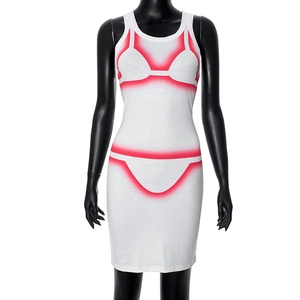 Detailed close-up of the creative red gradient bikini graphic print on white tank dress