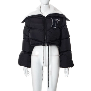 Detail of black cropped puffer jacket featuring a white fleece collar and letter F embroidery