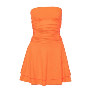 Detail of bright orange tube top mini dress featuring dense ruching and double-layered hem