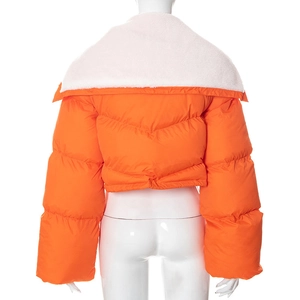 Rear view of orange quilted puffer jacket featuring a large white faux shearling collar