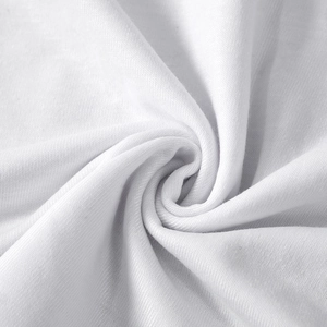 Close-up of the fine knitted fabric texture and soft white material on the sleeveless dress