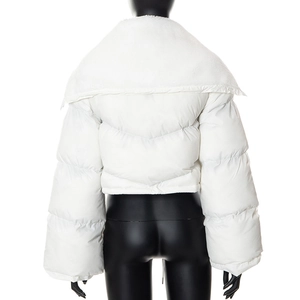 Rear view of white quilted puffer jacket with a plush faux shearling wide collar detail