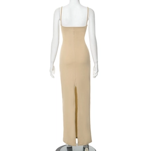 Rear detail of a slim khaki maxi dress showing thin straps and a long back slit design