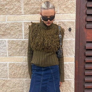 Women's olive green zip knit cardigan with fringe vest and denim maxi skirt street style