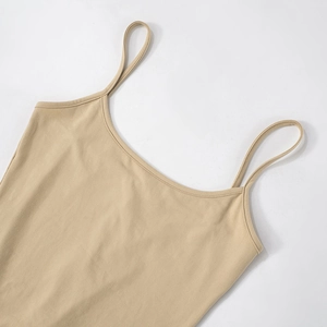 Detail of khaki slim-fit maxi dress showing the U-neck and delicate spaghetti straps