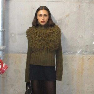 Slim fit olive green ribbed knit cardigan with plush faux fur trim and zip closure
