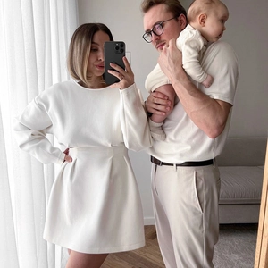 Matching family set featuring cream long sleeve dress and neutral outfits for autumn