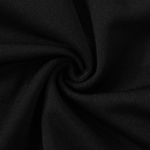 Close-up of black ribbed knit fabric showing fine texture and draped material quality
