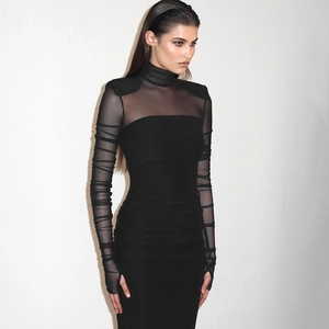 Close-up of sheer mesh high neck and shoulder pads on black slim-fit evening maxi dress