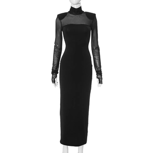 Detail view of sheer mesh sleeves with shoulder pads and finger loops on a black maxi dress