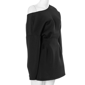 Detail view of the asymmetric black mini dress with one-shoulder design and waist shaping