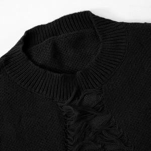 Detail view of black knit sweater with ribbed crew neck and distressed fringe mesh design