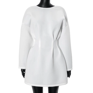 Detail of white long sleeve dress showing thick fabric texture and waist pleat design