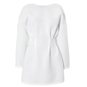 Detailed view of the waist pleats and structured silhouette of the white long sleeve dress