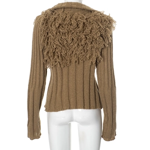 Close-up of brown ribbed knit cardigan featuring bohemian style fringe back details