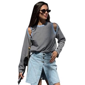Striped off-shoulder long sleeve top with blue trim and button-front denim skirt