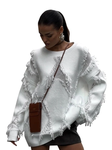 White crew neck knit sweater with distressed fringe details and loose fit design
