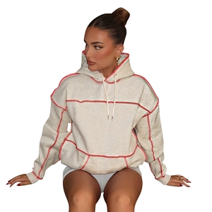 Oversized oatmeal hoodie for women with red contrast stitching and drawstring hood