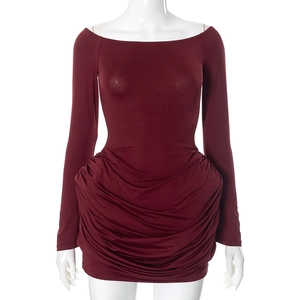 Detail of the elegant burgundy off-shoulder dress featuring sophisticated ruched layers